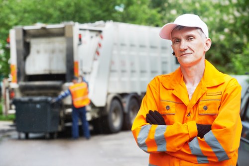 Waste clearance professionals handling residential waste in South West London