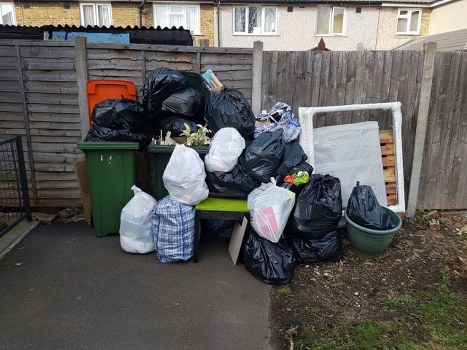 Professional team clearing a flat in South West London